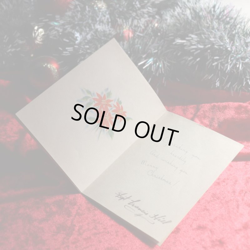 アンティーククリスマスカード|ポインセチアとクリスマスリースを抱える男女アンティークカード