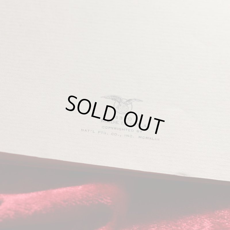 アンティーククリスマスカード|ポインセチアとクリスマスリースを抱える男女アンティークカード