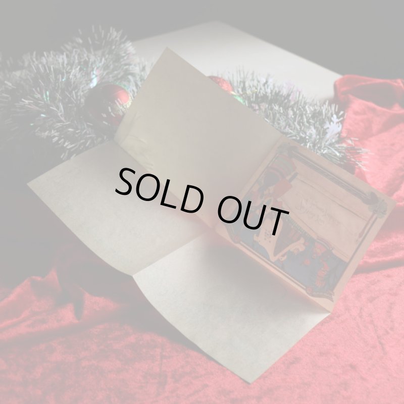 アンティーククリスマスカード紙もの｜クリスマスの準備をする男女1940年代ヴィンテージカード