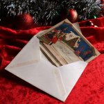 アンティーククリスマスカード紙もの｜クリスマスの準備をする男女1940年代ヴィンテージカード