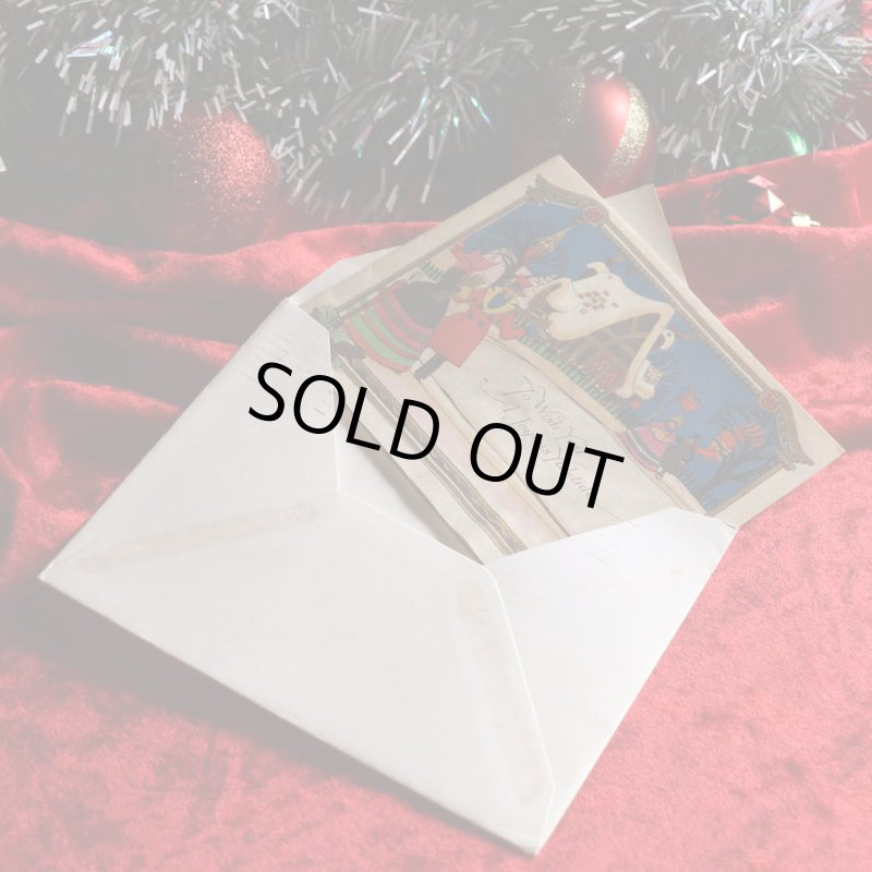 アンティーククリスマスカード紙もの｜クリスマスの準備をする男女1940年代ヴィンテージカード