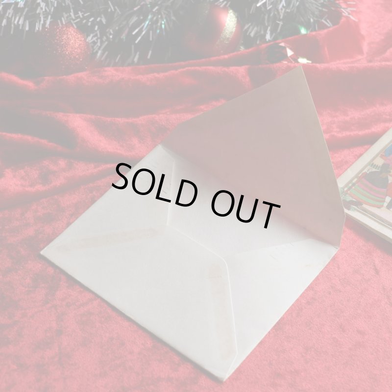 アンティーククリスマスカード紙もの｜クリスマスの準備をする男女1940年代ヴィンテージカード