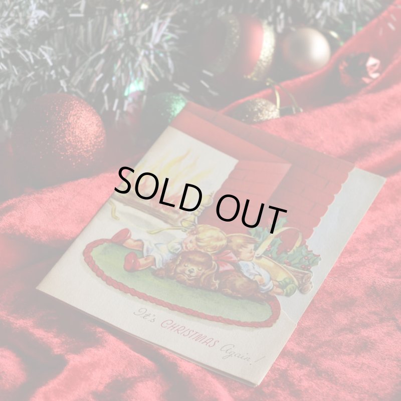 アンティーククリスマスカード紙もの｜暖炉の前でクリスマスの夢を見る子供と犬1940年代