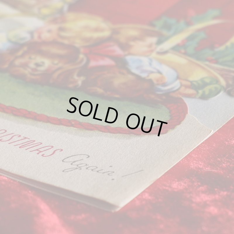 アンティーククリスマスカード紙もの｜暖炉の前でクリスマスの夢を見る子供と犬1940年代