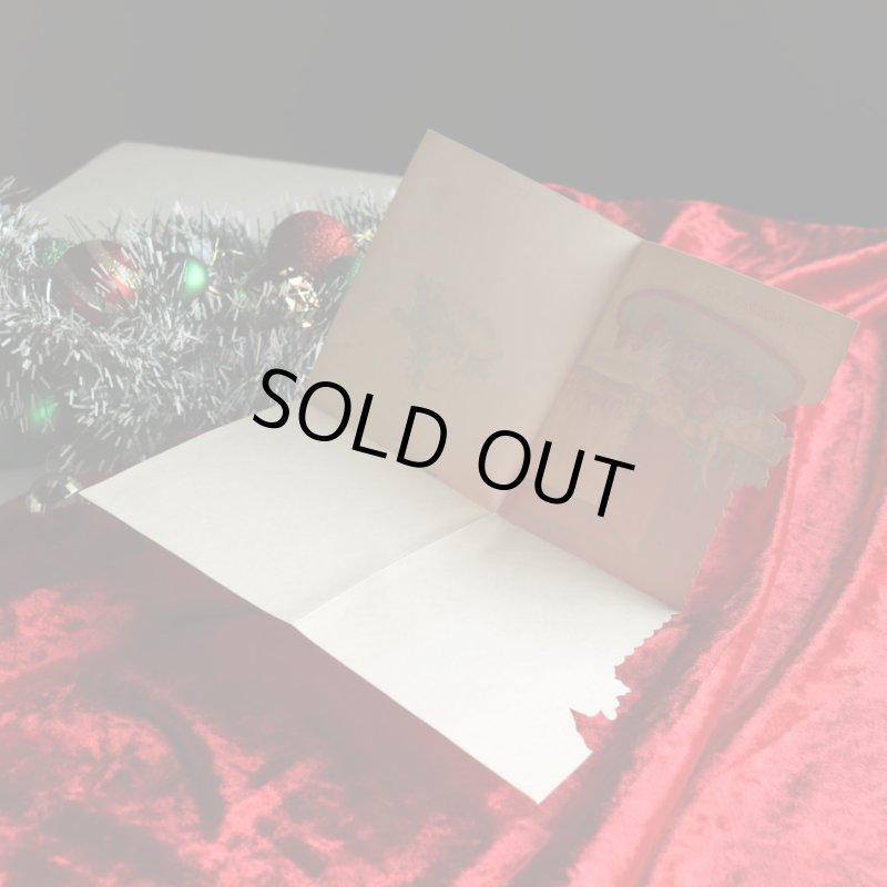 アンティーククリスマスカード紙もの｜暖炉の前でクリスマスの夢を見る子供と犬1940年代