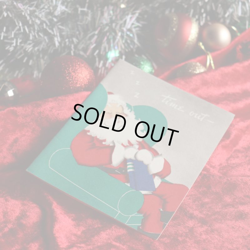 アンティーククリスマスカード紙もの｜ソファーで休憩するサンタクロース1940年代