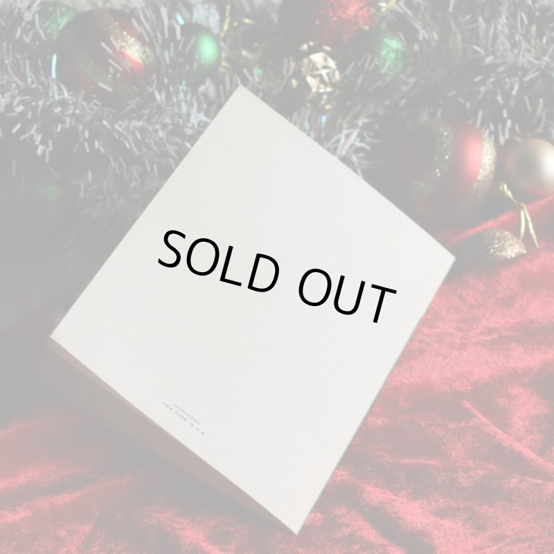 アンティーククリスマスカード紙もの｜ソファーで休憩するサンタクロース1940年代