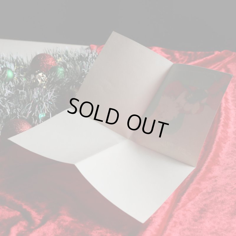 アンティーククリスマスカード紙もの｜ソファーで休憩するサンタクロース1940年代