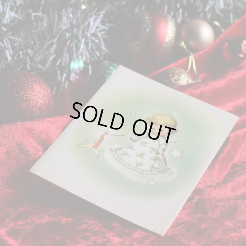 アンティーククリスマスカード紙もの｜キャンドルに灯りをつける天使1940年代