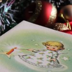 アンティーククリスマスカード紙もの｜キャンドルに灯りをつける天使1940年代