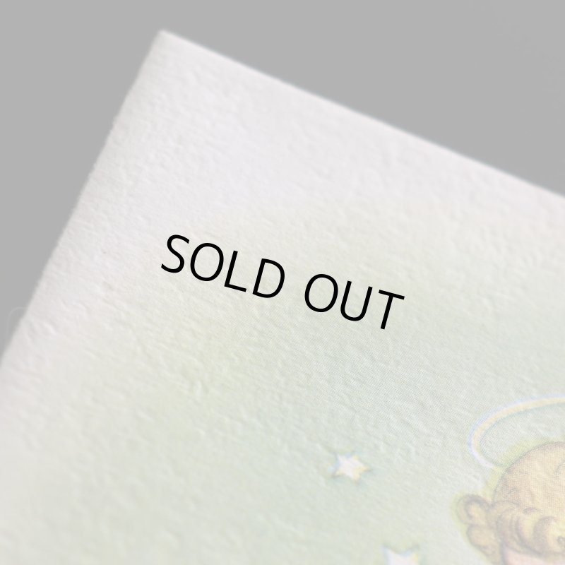 アンティーククリスマスカード紙もの｜キャンドルに灯りをつける天使1940年代