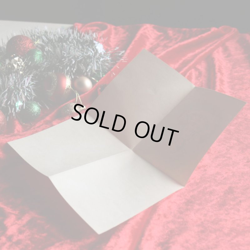 アンティーククリスマスカード紙もの｜キャンドルに灯りをつける天使1940年代