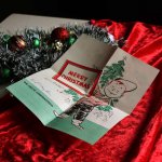 アンティーククリスマスカード紙もの｜クリスマスのメッセージに悩む男の子天使1960年代
