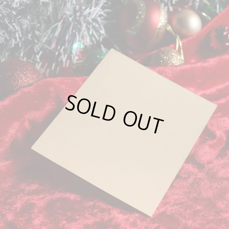 アンティーククリスマスカード紙もの｜雪の舞う町と老人1940年代